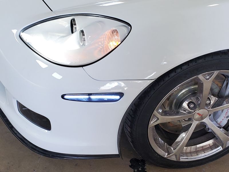 The same Corvette after repair, the front corner rebuilt and refinished.