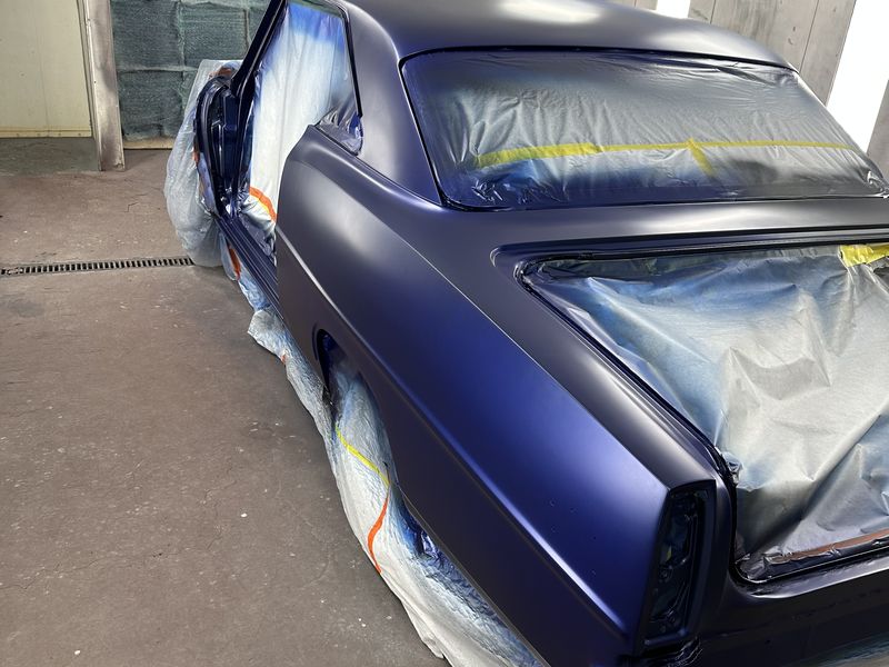 The Nova in the booth with the base coat laid on, still flat before any clear.