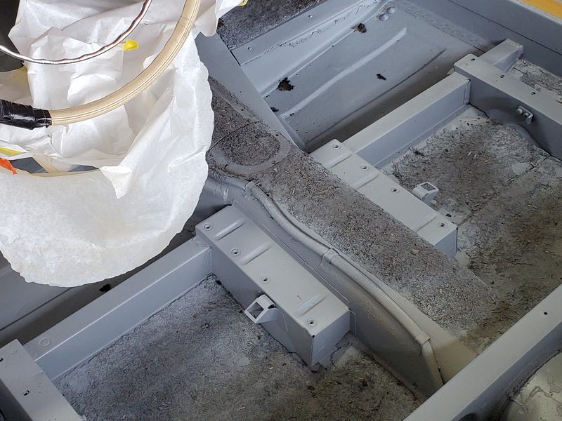 The Mercedes roadster body shell on a frame jig during restoration.